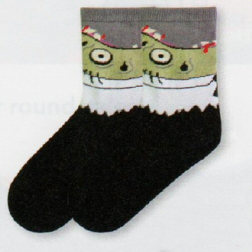 K Bell Kids Zombie Sock shows a Business Man turned Zombie. Black Suit, White Shirt, and Black Tie. He has a Zombie Green Face, Wild Eyes and Blood Red on White Teeth.