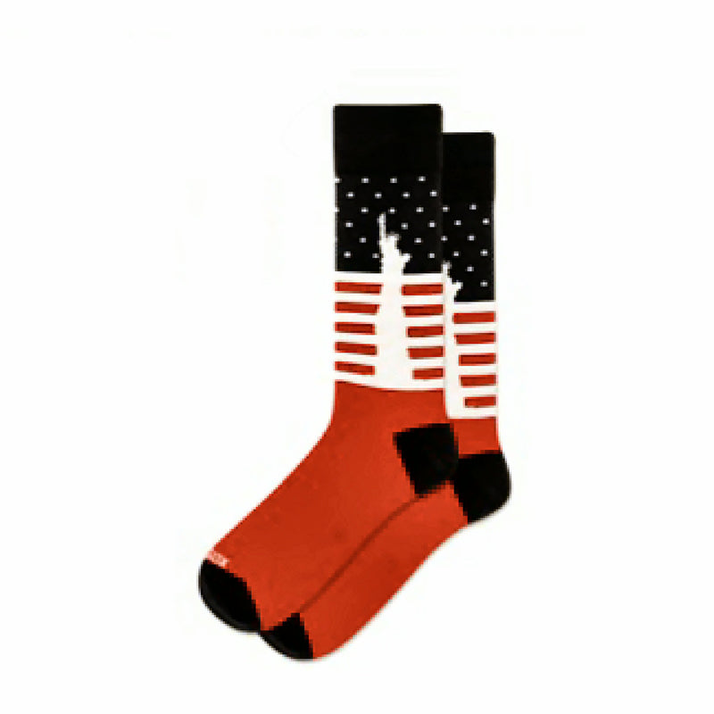 Red, White, and Blue sock with American flag design interrupted by the Statue of Liberty on a white background