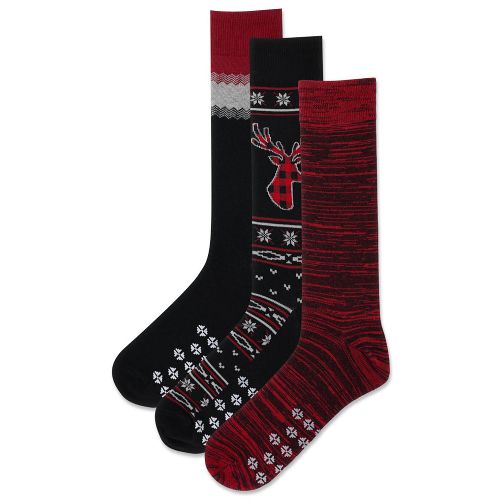 Hot Sox Mens Christmas Cookies Gift Box Reindeer Non Skid Socks have 3 Socks in the Box. Red and Black variegated woven one. Black with Reindeer with Poinsettia Designs. The last with Black White and Red Chevrons. The Non Skids are White Snowflakes.