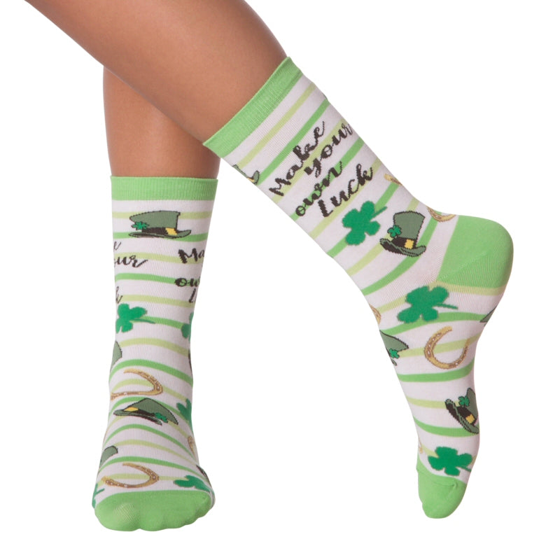 K Bell Make Luck Sock is really about what is in Bold Black Cursive Letters, "Make Your Own Luck". The Sock on Bright White with Bright Greens Yellows Gold and Black make a simple wish for fun and happiness! It just happens to be worn by a Model!