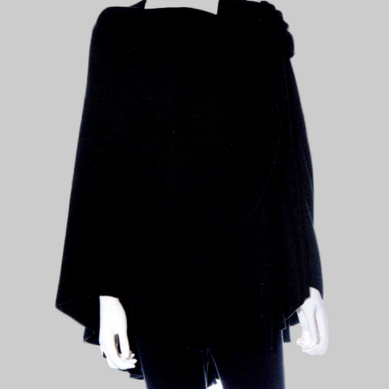 A black Cashmere shawl displayed on a white mannequin against a plain white background