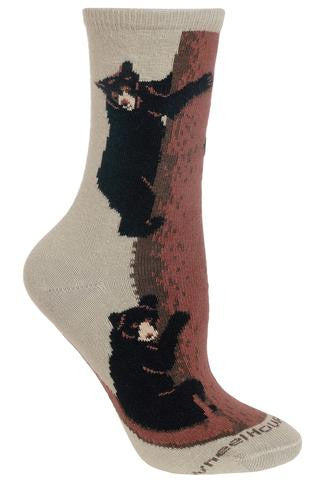 Wheel House Designs Bear Climbing On Stone shows three Black Bears climbing a Conifer Tree Trunk.