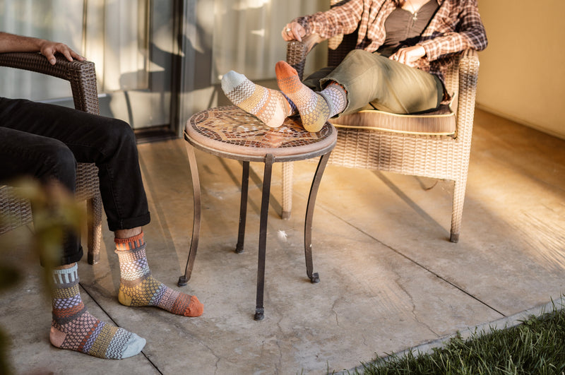 Solmate Adult Olive Crew is made for both Male and Female sizes, as seen on these Models.
