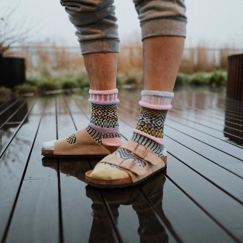 Solmate Adult Crew Lilac Sock is Shown here on a Male Model.